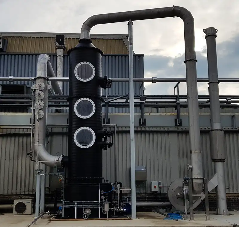 Avoiding odor nuisance emission from a gas flow